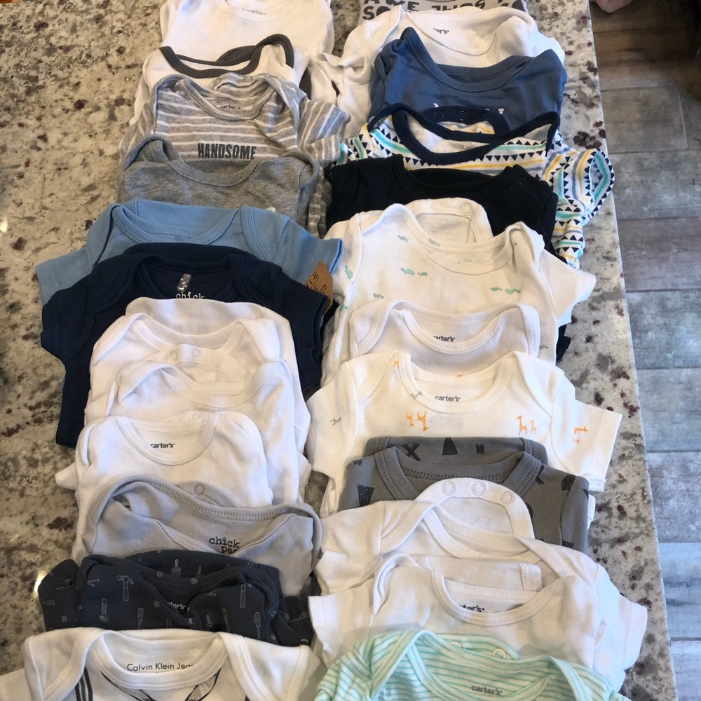 23 various onesies 0-3 and 3 months